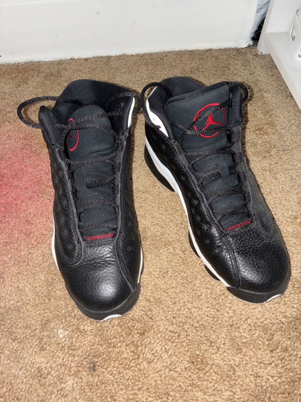 Jordan Black Leather Sneakers with Red Logo Accents